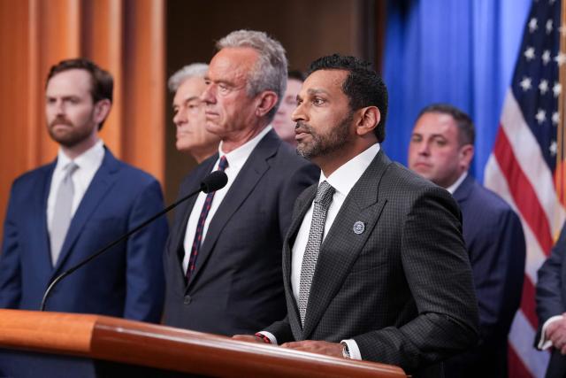 FBI Director Kash Patel (R) speaks during a press conference announcing annual healthcare fraud takedown results at the Department of Justice in Washington, DC on June 23, 2026. (Photo by Ken Cedeno / AFP)