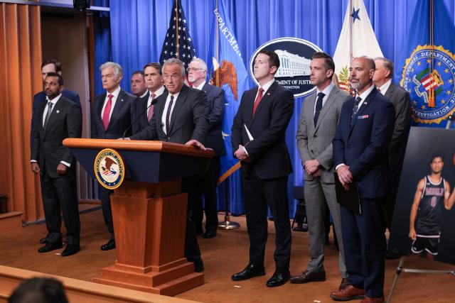 US Secretary of Health and Human Services Robert F. Kennedy Jr., speaks during a press conference announcing annual healthcare fraud takedown results at the Department of Justice in Washington, DC on June 23, 2026. Also pictured, L-R, FBI Director Kash Patel, Medicare and Medicaid Administrator Mehmet Oz, Acting Attorney General Todd Blanche, US Assistant Attorney General of the Justice Department's Fraud Division Colin McDonald, Acting Deputy Executive Associate Director of Homeland Security Investigations (HSI) Matthew Millhollin and Drug Enforcement Administration (DEA) Administrator Terry Cole. (Photo by Ken Cedeno / AFP)