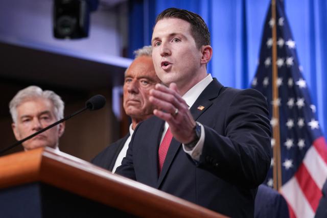 US Assistant Attorney General of the Justice Department's Fraud Division Colin McDonald (R), speaks during a press conference announcing annual healthcare fraud takedown results at the Department of Justice in Washington, DC on June 23, 2026. (Photo by Ken Cedeno / AFP)