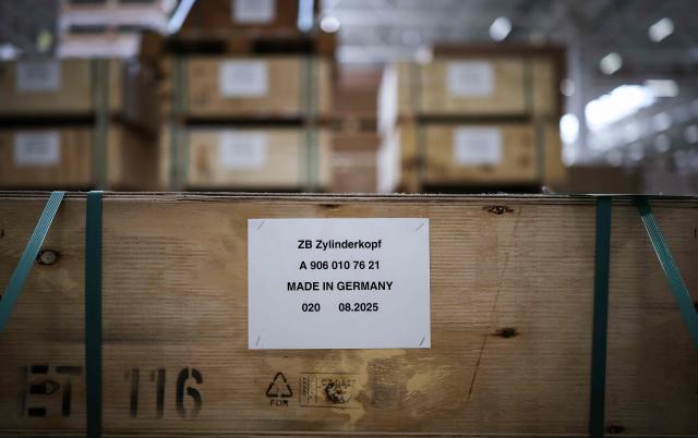 Spare parts packaged for worldwide shipment are stored in the warehouse of the new Daimler Truck Global Parts Center (GPC) in Halberstadt, eastern Germany, on June 23, 2026. Following its opening in 2025, the company has brought the logistics center fully online and now ships to 170 countries worldwide. (Photo by Ronny HARTMANN / AFP)
