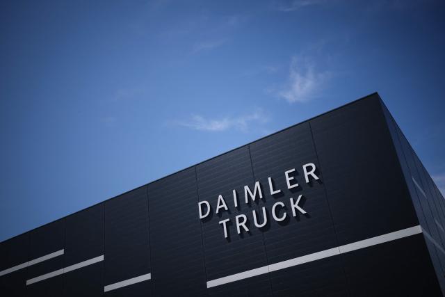 The lettering Daimler Truck is seen at the warehouse of the new Daimler Truck Global Parts Center (GPC) in Halberstadt, eastern Germany, on June 23, 2026. Following its opening in 2025, the company has brought the logistics center fully online and now ships to 170 countries worldwide. (Photo by Ronny HARTMANN / AFP)