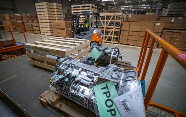 Spare parts packaged for worldwide shipment are stored in the warehouse of the new Daimler Truck Global Parts Center (GPC) in Halberstadt, eastern Germany, on June 23, 2026. Following its opening in 2025, the company has brought the logistics center fully online and now ships to 170 countries worldwide. (Photo by Ronny HARTMANN / AFP)