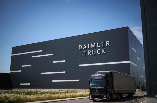 The lettering Daimler Truck is seen at the warehouse of the new Daimler Truck Global Parts Center (GPC) in Halberstadt, eastern Germany, on June 23, 2026. Following its opening in 2025, the company has brought the logistics center fully online and now ships to 170 countries worldwide. (Photo by Ronny HARTMANN / AFP)