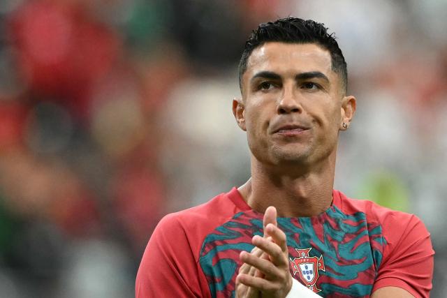 Portugal's forward #07 Cristiano Ronaldo applauds during warm up prior to the  2026 World Cup Group K football match between Portugal and Uzbekistan at the Houston Stadium in Houston on June 23, 2026.  (Photo by RONALDO SCHEMIDT / AFP)