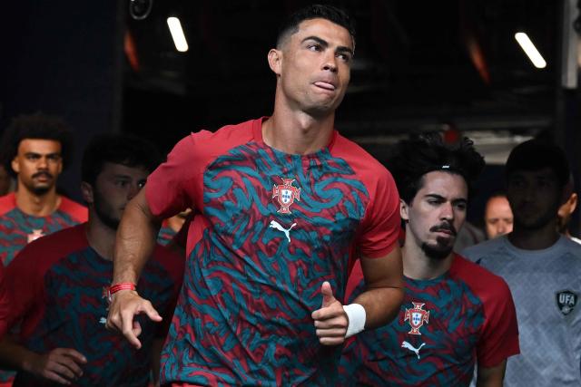 Portugal's forward #07 Cristiano Ronaldo arrives for the warm-up ahead of the 2026 World Cup Group K football match between Portugal and Uzbekistan at the Houston Stadium in Houston on June 23, 2026.  (Photo by Paul ELLIS / AFP)