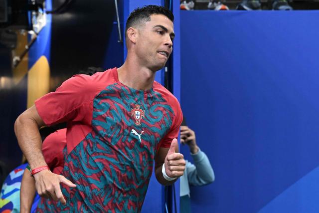 Portugal's forward #07 Cristiano Ronaldo arrives for the warm-up ahead of the 2026 World Cup Group K football match between Portugal and Uzbekistan at the Houston Stadium in Houston on June 23, 2026.  (Photo by Paul ELLIS / AFP)