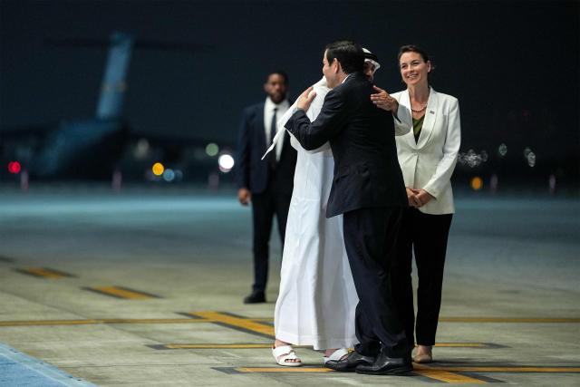 US Secretary of State Marco Rubio is greeted by UAE Ambassador to the US Yousef al-Otaiba upon arrival at al-Bateen Executive Airport in Abu Dhabi on June 23, 2026, on the first stop of a tour of Gulf states aimed at showing solidarity with key allies hit hard by the Middle East war. Rubio's delicate mission comes with Gulf countries having paid a heavy economic price for the US and Israel's decision to go to war with Iran against their wishes, prompting Tehran to lash out at its regional neighbours. (Photo by Eric Lee / POOL / AFP)