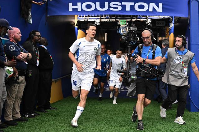 Uzbekistan's forward #14 Eldor Shomurodov arrives for the warm-up ahead of the 2026 World Cup Group K football match between Portugal and Uzbekistan at the Houston Stadium in Houston on June 23, 2026.  (Photo by Paul ELLIS / AFP)