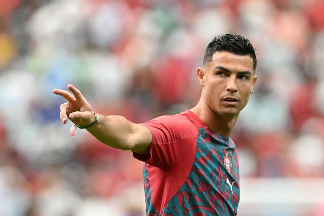 Portugal's forward #07 Cristiano Ronaldo gestures during warm up prior to the 2026 World Cup Group K football match between Portugal and Uzbekistan at the Houston Stadium in Houston on June 23, 2026.  (Photo by RONALDO SCHEMIDT / AFP)