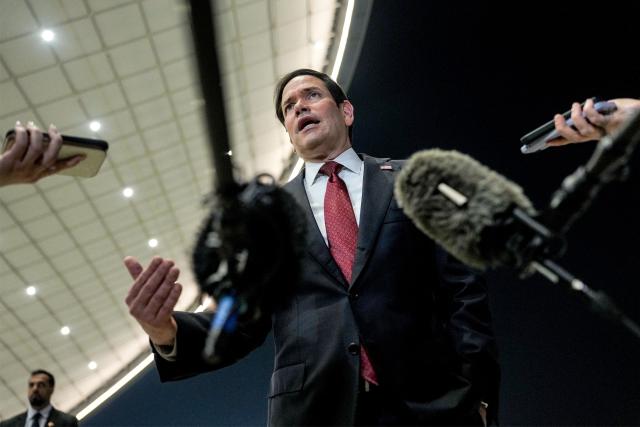US Secretary of State Marco Rubio speaks to the media upon arrival at al-Bateen Executive Airport in Abu Dhabi on June 23, 2026, on the first stop of a tour of Gulf states aimed at showing solidarity with key allies hit hard by the Middle East war. Rubio's delicate mission comes with Gulf countries having paid a heavy economic price for the US and Israel's decision to go to war with Iran against their wishes, prompting Tehran to lash out at its regional neighbours. (Photo by Eric Lee / POOL / AFP)