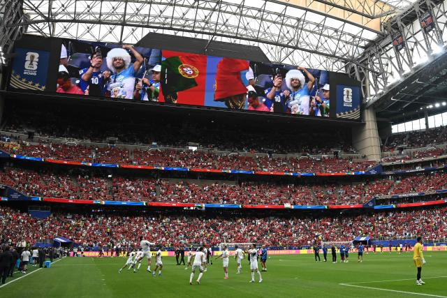 Uzbekistan's players warm up ahead of the 2026 World Cup Group K football match between Portugal and Uzbekistan at the Houston Stadium in Houston on June 23, 2026.  (Photo by Paul ELLIS / AFP)