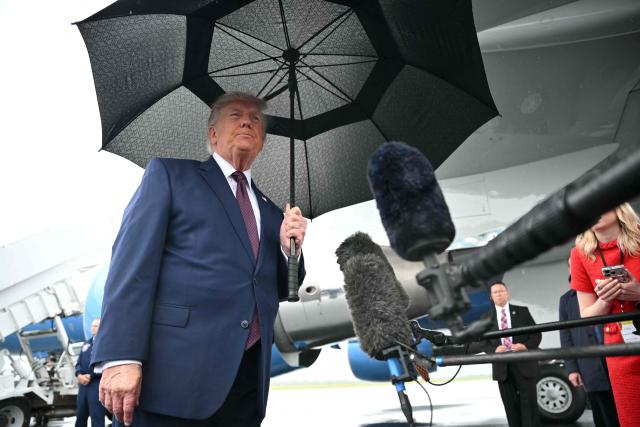 US President Donald Trump speaks to the press after stepping off Air Force One at Reading Regional Airport (RDG) in Berks County, Pennsylvania, on June 23, 2026. (Photo by Mandel NGAN / AFP)