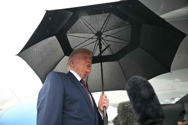 US President Donald Trump speaks to the press after stepping off Air Force One at Reading Regional Airport (RDG) in Berks County, Pennsylvania, on June 23, 2026. (Photo by Mandel NGAN / AFP)