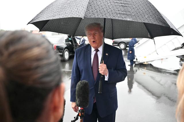 US President Donald Trump speaks to the press after stepping off Air Force One at Reading Regional Airport (RDG) in Berks County, Pennsylvania, on June 23, 2026. (Photo by Mandel NGAN / AFP)