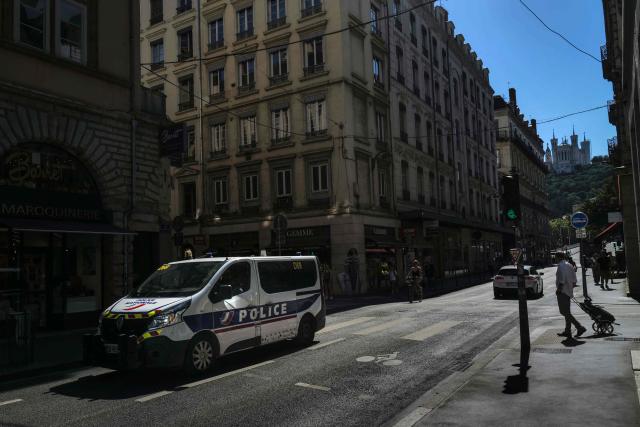 This photograph shows police van in the Grenette street in Lyon on June 18,2026. The Grenette street in central Lyon is testing the cohabitation between the ecologist city council and the Metropolis, which has just swung to the right. (Photo by OLIVIER CHASSIGNOLE / AFP)
