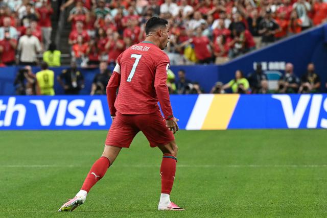 Portugal's forward #07 Cristiano Ronaldo celebrates after scoring the opening goal during the 2026 World Cup Group K football match between Portugal and Uzbekistan at the Houston Stadium in Houston on June 23, 2026.  (Photo by RONALDO SCHEMIDT / AFP)