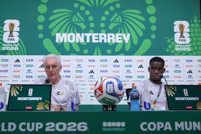 South Africa's Belgian head coach Hugo Broos (L) and midfielder #13 Sphephelo Sithole give a press conference at the Monterrey Stadium in Mexico on June 23, 2026, on the eve of the 2026 World Cup match between South Africa and South Korea. (Photo by Julio Cesar AGUILAR / AFP)