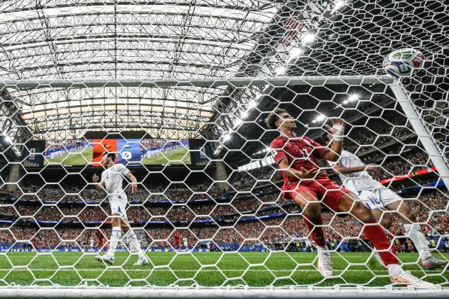 Portugal's forward #11 Joao Felix (R) reacts after his team's third goal  during the 2026 World Cup Group K football match between Portugal and Uzbekistan at the Houston Stadium in Houston on June 23, 2026.  (Photo by RONALDO SCHEMIDT / AFP)