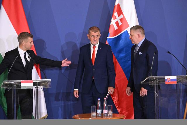 Prime Ministers of the Visegrad countries (L to R) Hungarian Prime Minister Peter Magyar, Czech Republic's Prime Minister Andrej Babis and Slovakia's Prime Minister Robert Fico arrive to deliver a press conference after a meeting of the Visegrad Group (V4) in the Royal Castle of Godollo, Hungary, on June 23, 2026. The Prime Ministers of the Visegrad countries discussed about energy security, migration and EU funds during a meeting aimed to strengthen Central European cooperation and coordinate common regional interests. (Photo by Attila KISBENEDEK / AFP)