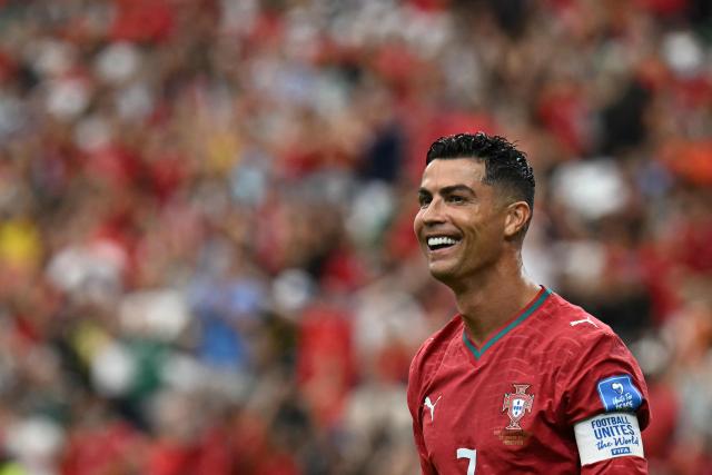 Portugal's forward #07 Cristiano Ronaldo reacts to his team's fourth goal during the 2026 World Cup Group K football match between Portugal and Uzbekistan at the Houston Stadium in Houston on June 23, 2026.  (Photo by Paul ELLIS / AFP)