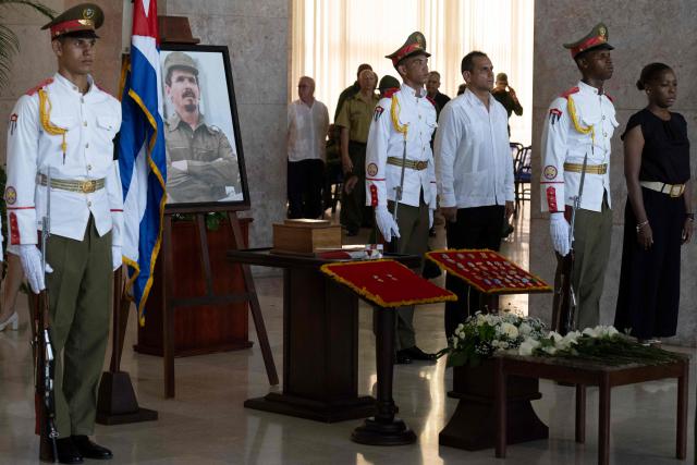 Soldiers pay tribute to the urn containing the remains of Commander Ramiro Valdes at the Ministry of the Revolutionary Armed Forces in Havana, on June 23, 2026. Ramiro Valdes Menendez, a close associate of brothers Fidel and Raul Castro and founder of the Cuban intelligence services, has died at the age of 94, Cuban President Miguel Diaz-Canel announced on June 21, 2026. (Photo by Pablo PORCIUNCULA / AFP)