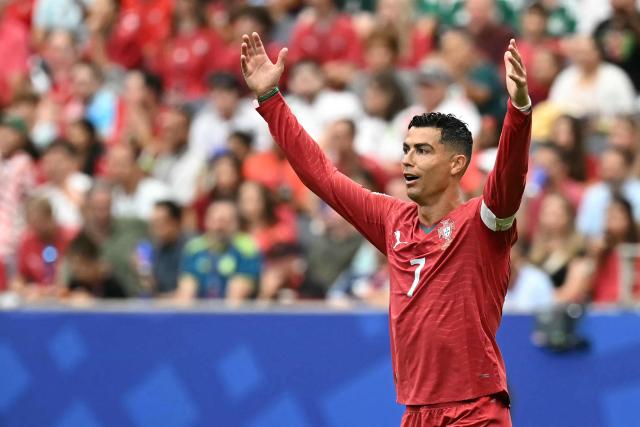 Portugal's forward #07 Cristiano Ronaldo reacts during the 2026 World Cup Group K football match between Portugal and Uzbekistan at the Houston Stadium in Houston on June 23, 2026.  (Photo by Paul ELLIS / AFP)