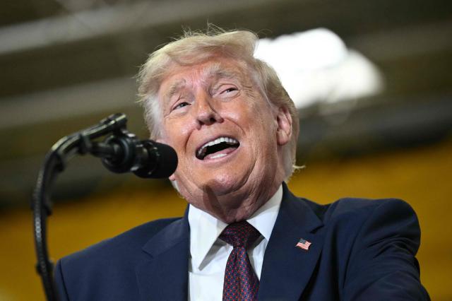 US President Donald Trump speaks during a visit to the Mack Trucks manufacturing facility in Macungie, Pennsylvania, on June 23, 2026. (Photo by Mandel NGAN / AFP)