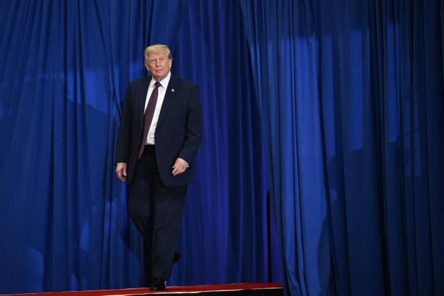 US President Donald Trump arrives to speak during a visit to the Mack Trucks manufacturing facility in Macungie, Pennsylvania, on June 23, 2026. (Photo by Mandel NGAN / AFP)