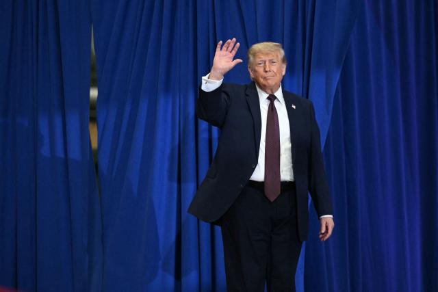 US President Donald Trump arrives to speak during a visit to the Mack Trucks manufacturing facility in Macungie, Pennsylvania, on June 23, 2026. (Photo by Mandel NGAN / AFP)