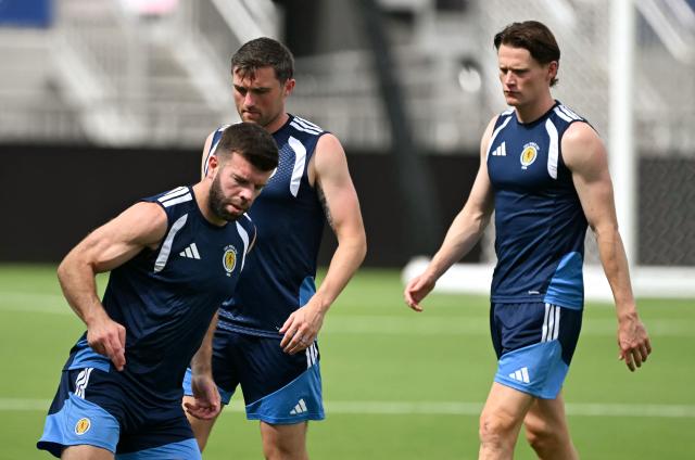 (L-R) Scotland's defender #05 Grant Hanley, Scotland's defender #15 John Souttar and midfielder #04 Scott McTominay attend a training session at Inter Miami Stadium in Fort Lauderdale, Florida on June 23, 2026. (Photo by CHANDAN KHANNA / AFP)