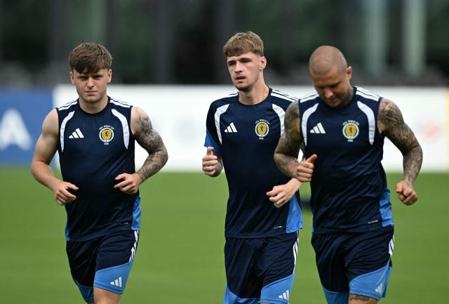Scotland's forward #17 Ben Gannon-Doak, midfielder #08 Tyler Fletcher and forward #09 Lyndon Dykes attend a training session at Inter Miami Stadium in Fort Lauderdale, Florida on June 23, 2026. (Photo by CHANDAN KHANNA / AFP)