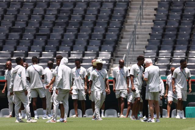 South Africa's players walk on the pitch at the Monterrey Stadium in Mexico on June 23, 2026, on the eve of the 2026 World Cup match between South Africa and South Korea. (Photo by Julio Cesar AGUILAR / AFP)