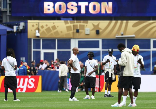 Ghana players walk on the pitch ahead of the 2026 World Cup Group L football match between England and Ghana at the Boston Stadium in Foxborough on June 23, 2026.  (Photo by FRANCK FIFE / AFP)