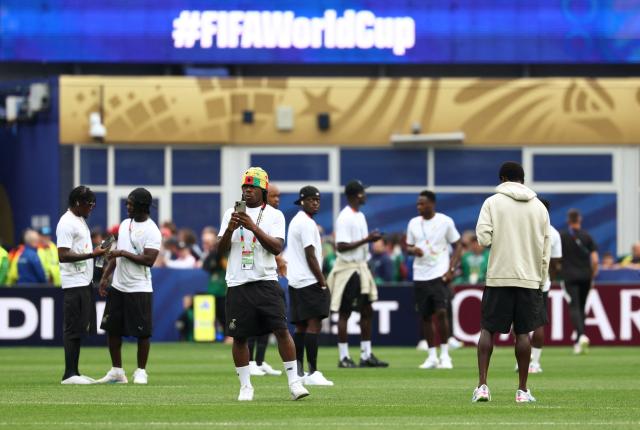 Ghana players walk on the pitch ahead of the 2026 World Cup Group L football match between England and Ghana at the Boston Stadium in Foxborough on June 23, 2026.  (Photo by FRANCK FIFE / AFP)