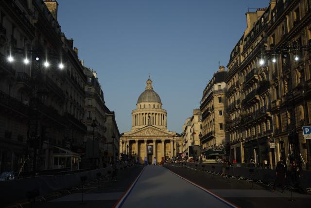 A portrait of the late historian and resistance fighter Marc Bloch adorns the facade of the Pantheon before his induction ceremony along with his wife Simonne Vidal, in Paris on June 23, 2026. Historian Marc Bloch, a soldier and Resistance fighter murdered by the Gestapo, will be inducted into Frances Panthéon on June 23 in a tribute to the author of "Strange Defeat", a major work tahat President Emmanuel Macron has described as a warning against the "conformism" that undermines the "French will."
The ceremony marks the sixth Panthéon induction of Macron's two terms, following those of Simone Veil, writer Maurice Genevoix, Josephine Baker, Resistance fighter Missak Manouchian and Robert Badinter. (Photo by Yoan VALAT / POOL / AFP)