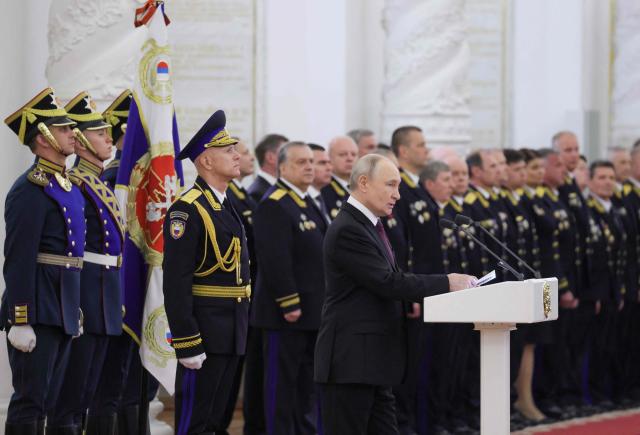 In this pool photograph distributed by the Russian state agency Sputnik, Russia's President Vladimir Putin hosts a ceremony to award the Presidential Regiment of the Federal Guard Service with the Order of Zhukov at the Kremlin in Moscow on June 23, 2026. (Photo by Mikhail METZEL / POOL / AFP)