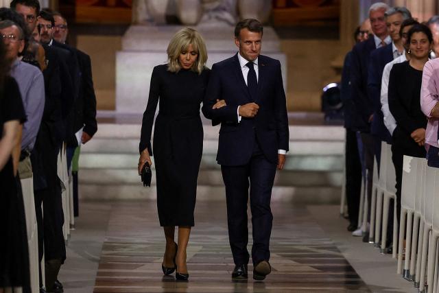 France's President Emmanuel Macron and his wife Brigitte Macron attend the Pantheon induction ceremony for the late historian and resistance fighter Marc Bloch and his wife Simonne Bloch in Paris on June 23, 2026. Historian Marc Bloch, a soldier and Resistance fighter murdered by the Gestapo, will be inducted into Frances Panthéon on June 23 in a tribute to the author of "Strange Defeat", a major work tahat President Emmanuel Macron has described as a warning against the "conformism" that undermines the "French will."
The ceremony marks the sixth Panthéon induction of Macron's two terms, following those of Simone Veil, writer Maurice Genevoix, Josephine Baker, Resistance fighter Missak Manouchian and Robert Badinter. (Photo by Alice Sacco / POOL / AFP)
