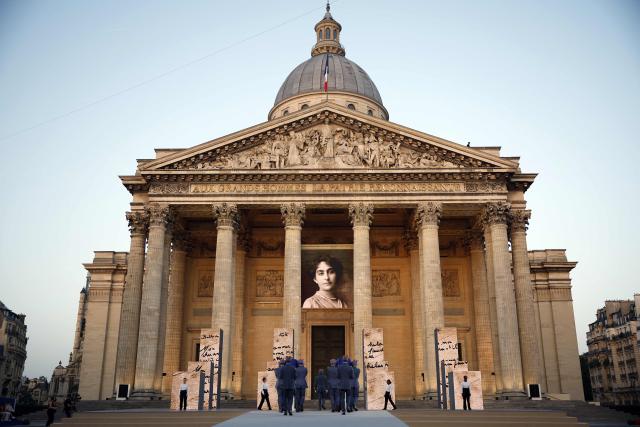 Soldiers carry the cenotaphs of the late historian and resistance fighter Marc Bloch and his wife Simonne Bloch during his Pantheon induction ceremony in Paris on June 23, 2026. Historian Marc Bloch, a soldier and Resistance fighter murdered by the Gestapo, will be inducted into Frances Panthéon on June 23 in a tribute to the author of "Strange Defeat", a major work tahat President Emmanuel Macron has described as a warning against the "conformism" that undermines the "French will."
The ceremony marks the sixth Panthéon induction of Macron's two terms, following those of Simone Veil, writer Maurice Genevoix, Josephine Baker, Resistance fighter Missak Manouchian and Robert Badinter. (Photo by Yoan VALAT / POOL / AFP)