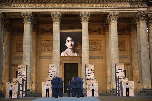 Soldiers carry the cenotaphs of the late historian and resistance fighter Marc Bloch and his wife Simonne Bloch during his Pantheon induction ceremony in Paris on June 23, 2026. Historian Marc Bloch, a soldier and Resistance fighter murdered by the Gestapo, will be inducted into Frances Panthéon on June 23 in a tribute to the author of "Strange Defeat", a major work tahat President Emmanuel Macron has described as a warning against the "conformism" that undermines the "French will."
The ceremony marks the sixth Panthéon induction of Macron's two terms, following those of Simone Veil, writer Maurice Genevoix, Josephine Baker, Resistance fighter Missak Manouchian and Robert Badinter. (Photo by Yoan VALAT / POOL / AFP)