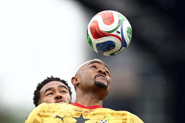 TOPSHOT - Ghana's forward #09 Jordan Ayew jumps for the ball  during the 2026 World Cup Group L football match between England and Ghana at the Boston Stadium in Foxborough on June 23, 2026.  (Photo by CHARLY TRIBALLEAU / AFP)