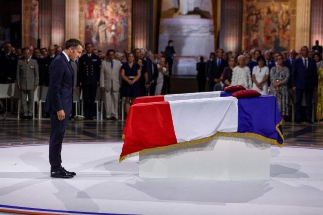 France's President Emmanuel Macron pays his respects at the cenotaphs of the late historian and resistance fighter Marc Bloch and his wife Simonne Bloch during the Pantheon induction ceremony in Paris on June 23, 2026. Historian Marc Bloch, a soldier and Resistance fighter murdered by the Gestapo, will be inducted into Frances Panthéon on June 23 in a tribute to the author of "Strange Defeat", a major work tahat President Emmanuel Macron has described as a warning against the "conformism" that undermines the "French will."
The ceremony marks the sixth Panthéon induction of Macron's two terms, following those of Simone Veil, writer Maurice Genevoix, Josephine Baker, Resistance fighter Missak Manouchian and Robert Badinter. (Photo by Alice Sacco / POOL / AFP)