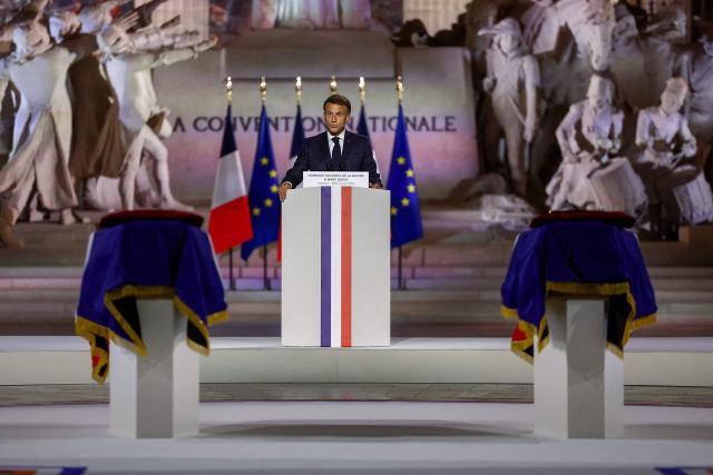 France's President Emmanuel Macron delivers a speech during the Pantheon induction ceremony for the late historian and resistance fighter Marc Bloch and his wife Simonne Bloch in Paris on June 23, 2026. Historian Marc Bloch, a soldier and Resistance fighter murdered by the Gestapo, will be inducted into Frances Panthéon on June 23 in a tribute to the author of "Strange Defeat", a major work tahat President Emmanuel Macron has described as a warning against the "conformism" that undermines the "French will."
The ceremony marks the sixth Panthéon induction of Macron's two terms, following those of Simone Veil, writer Maurice Genevoix, Josephine Baker, Resistance fighter Missak Manouchian and Robert Badinter. (Photo by Alice Sacco / POOL / AFP)