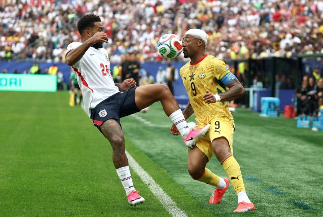 England's defender #24 Reece James (L) fights for the ball with Ghana's forward #09 Jordan Ayew during the 2026 World Cup Group L football match between England and Ghana at the Boston Stadium in Foxborough on June 23, 2026.  (Photo by FRANCK FIFE / AFP)