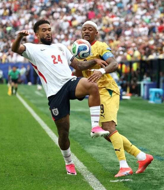 England's defender #24 Reece James (L) fights for the ball with Ghana's forward #09 Jordan Ayew during the 2026 World Cup Group L football match between England and Ghana at the Boston Stadium in Foxborough on June 23, 2026.  (Photo by FRANCK FIFE / AFP)