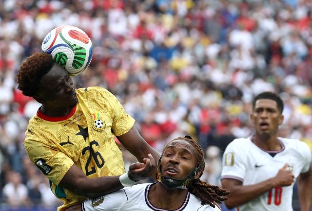Ghana's defender #26 Marvin Senaya (L) fights for the ball with England's defender #25 Djed Spence  during the 2026 World Cup Group L football match between England and Ghana at the Boston Stadium in Foxborough on June 23, 2026.  (Photo by FRANCK FIFE / AFP)