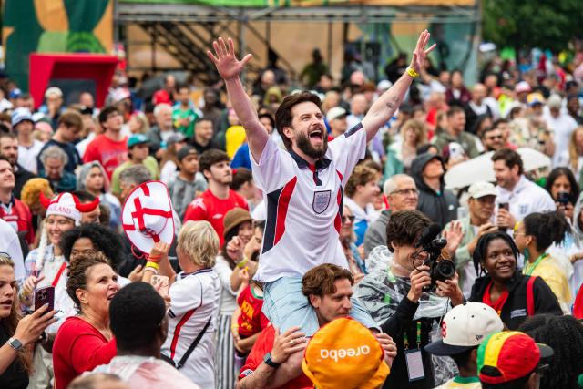 England fans cheer on their team at the FIFA Fan Festival watch party for the 2026 World Cup football tournament match between England and Ghana in Boston, Massachusetts, on June 23, 2026. (Photo by JOSEPH PREZIOSO / AFP)