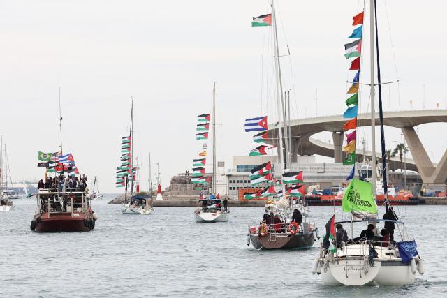 (FILES) Boats of a new humanitarian flotilla bound for the Gaza Strip make a symbolic leave from Barcelona's Port Vell on April 12, 2026 as the departure of the flotilla has been postponed due to bad weather. International condemnation has mounted since May 2026 regarding the treatment of these 430 activists, including around 30 French nationals. France and Italy have launched judicial investigations into allegations of torture and war crimes, which will seek to establish who is responsible, whilst Australia has announced an independent inquiry. The Israeli authorities have rejected these accusations. (Photo by Josep LAGO / AFP)