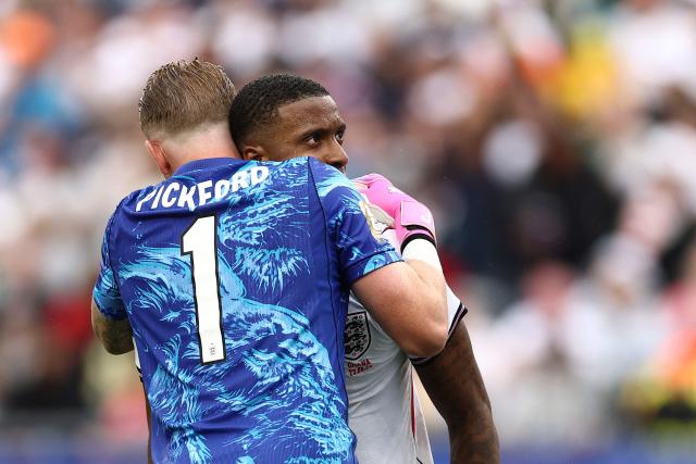 England's defender #02 Ezri Konsa (R) and England's goalkeeper #01 Jordan Pickford react  during the 2026 World Cup Group L football match between England and Ghana at the Boston Stadium in Foxborough on June 23, 2026.  (Photo by CHARLY TRIBALLEAU / AFP)