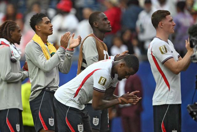 England's midfielder #10 Jude Bellingham (L) reacts  after a draw in the  2026 World Cup Group L football match between England and Ghana at the Boston Stadium in Foxborough on June 23, 2026.  (Photo by MAURO PIMENTEL / AFP)