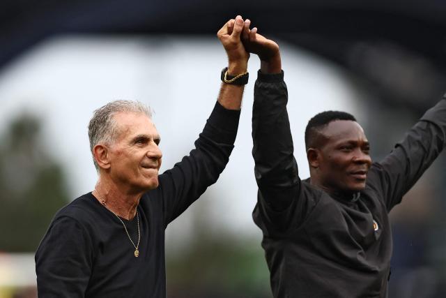 Ghana's Portuguese head coach Carlos Queiroz (L) reacts  after a draw in the  2026 World Cup Group L football match between England and Ghana at the Boston Stadium in Foxborough on June 23, 2026.  (Photo by CHARLY TRIBALLEAU / AFP)